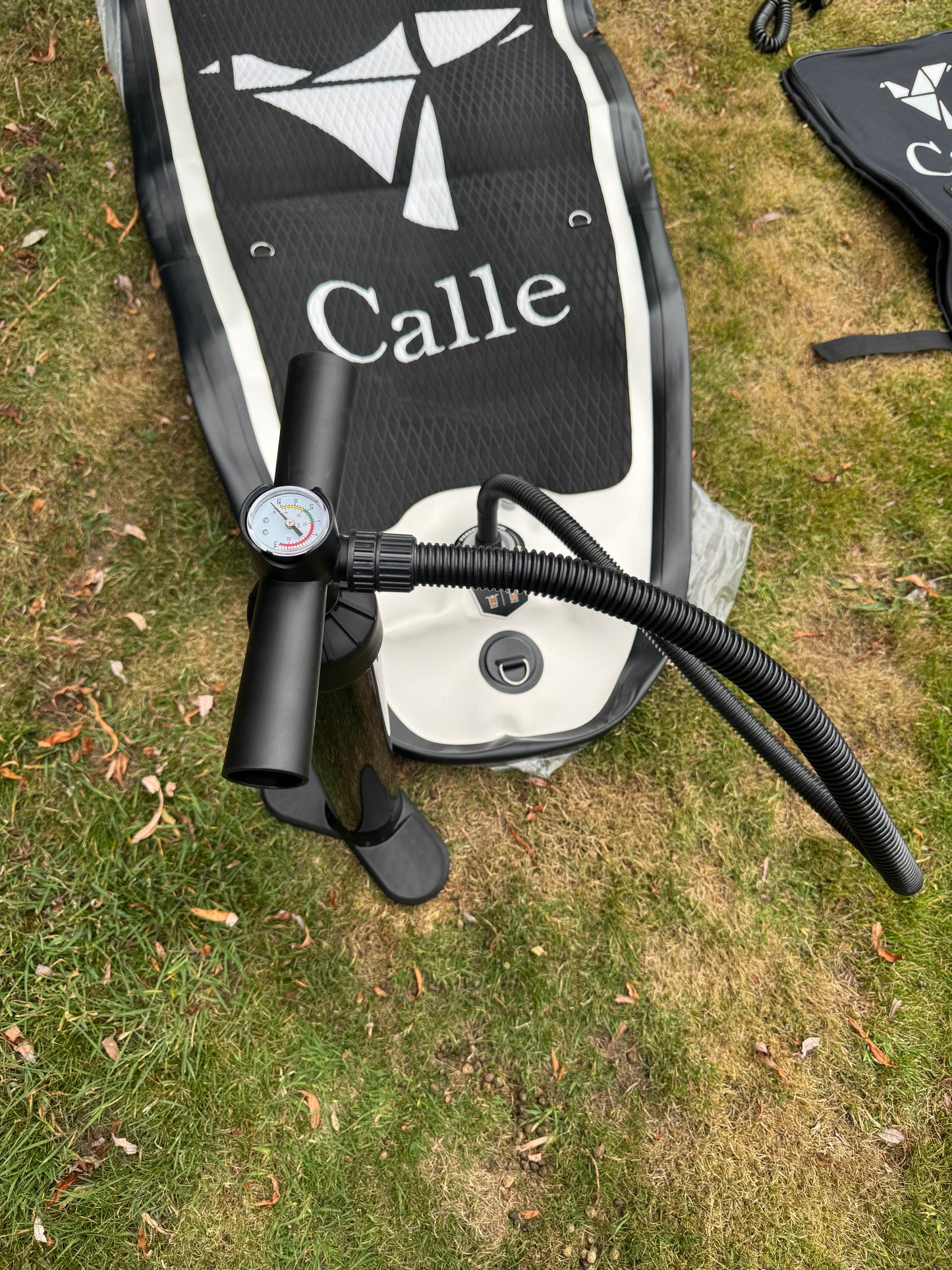 White & Black Paddle Board